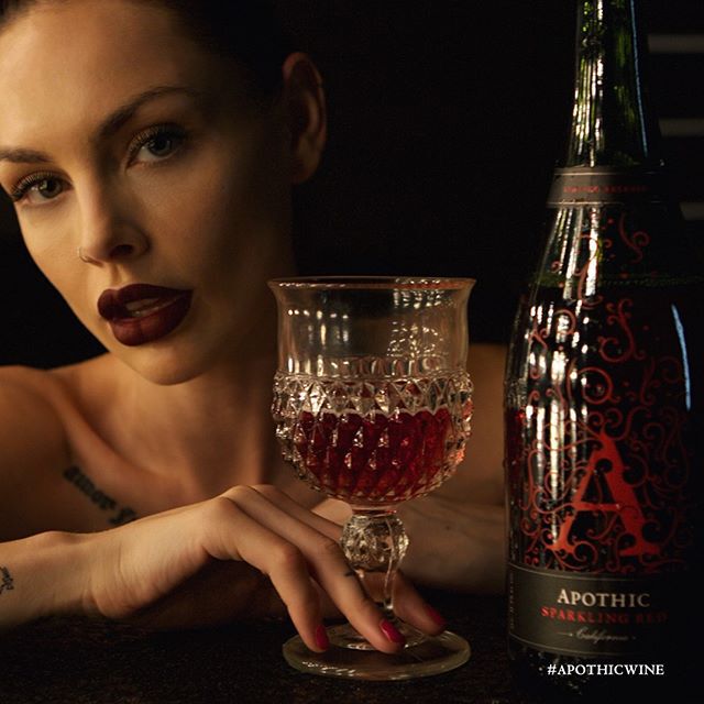 Woman enjoying a glass of Apothic Sparkling Red