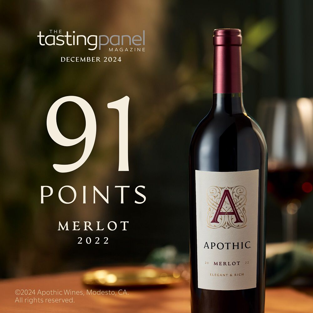 A 90-point rating badge from The Tasting Panel Magazine for the 2022 Apothic Merlot. The quote reads: 'Dark chocolate-cherry and a pinch of white pepper leads to a ripe mid-palate of purple plum. Finishes with toasted oak and cinnamon.' Dated December 2024.